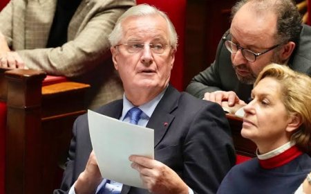 French lawmakers vote to oust prime minister in the first successful no-confidence vote since 1962