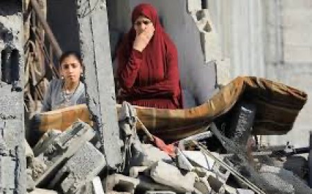 At least 60 people killed by Israeli strikes in Gaza as Israel lets minimal aid in