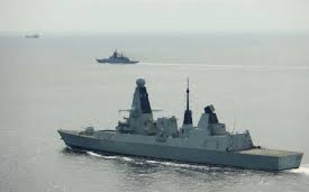 British Navy deploys warships and helicopters to track Russian vessel in English Channel.