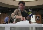 Early results show Russia’s main Kremlin party dominating tightly controlled parliamentary vote